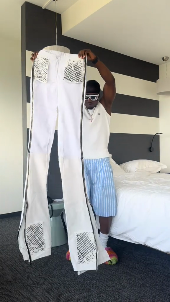 White Flared Pants with Cut - Out and Striped Detail