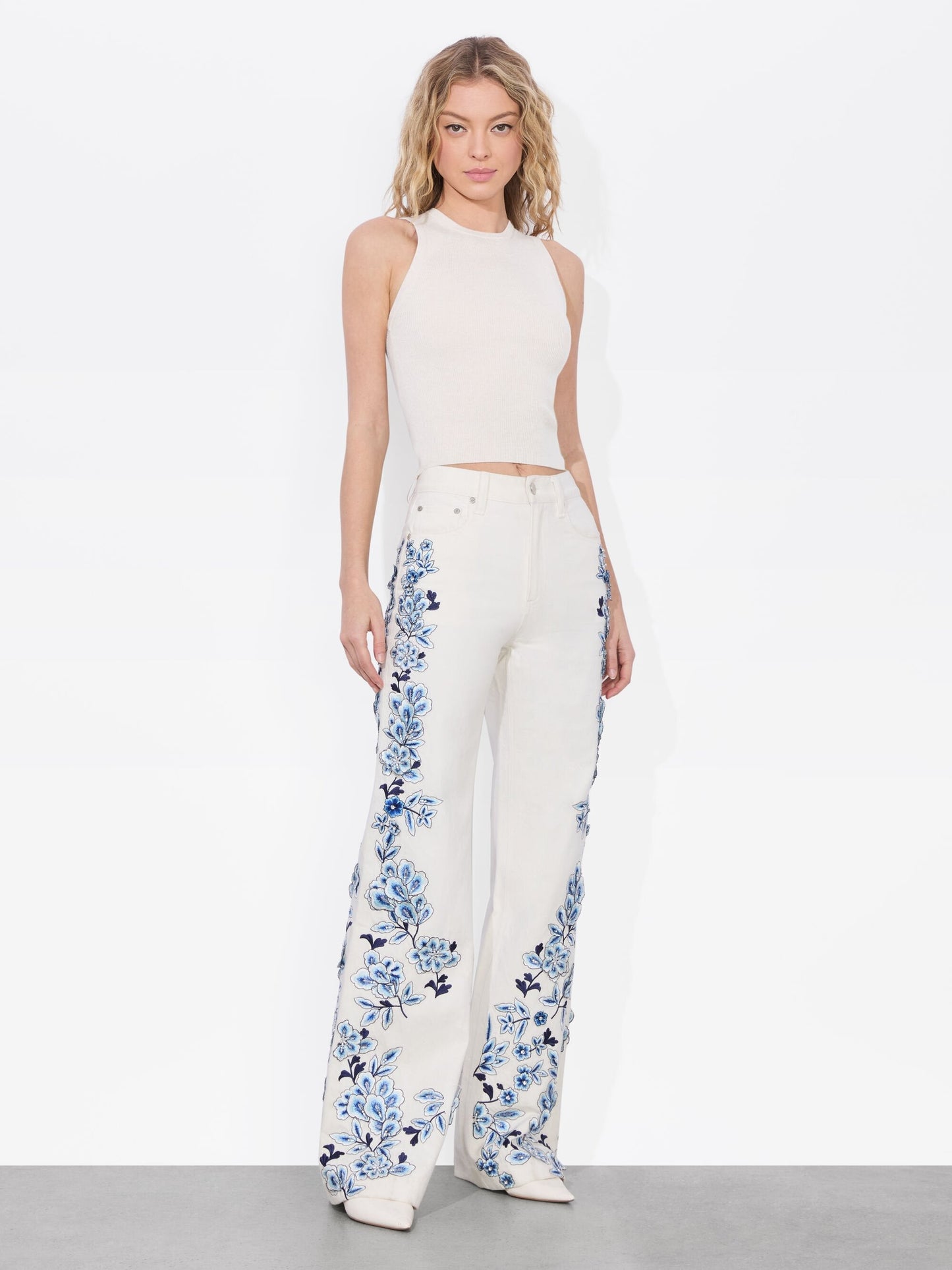 White Flared Jeans with Blue Floral Embroidery