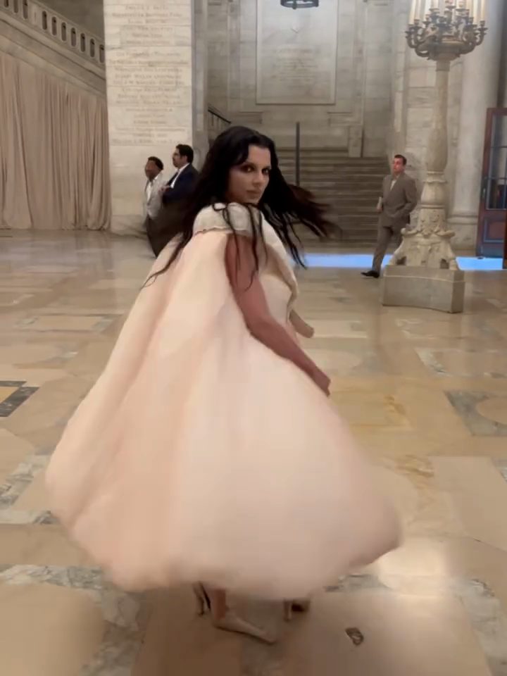 Pink Dress With Cape-Style Overlay and Bow Detail