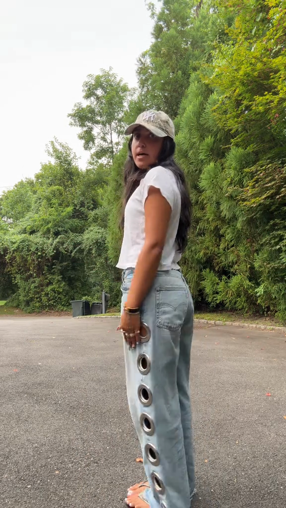 Light - Wash Denim Jeans with Circular Cutouts