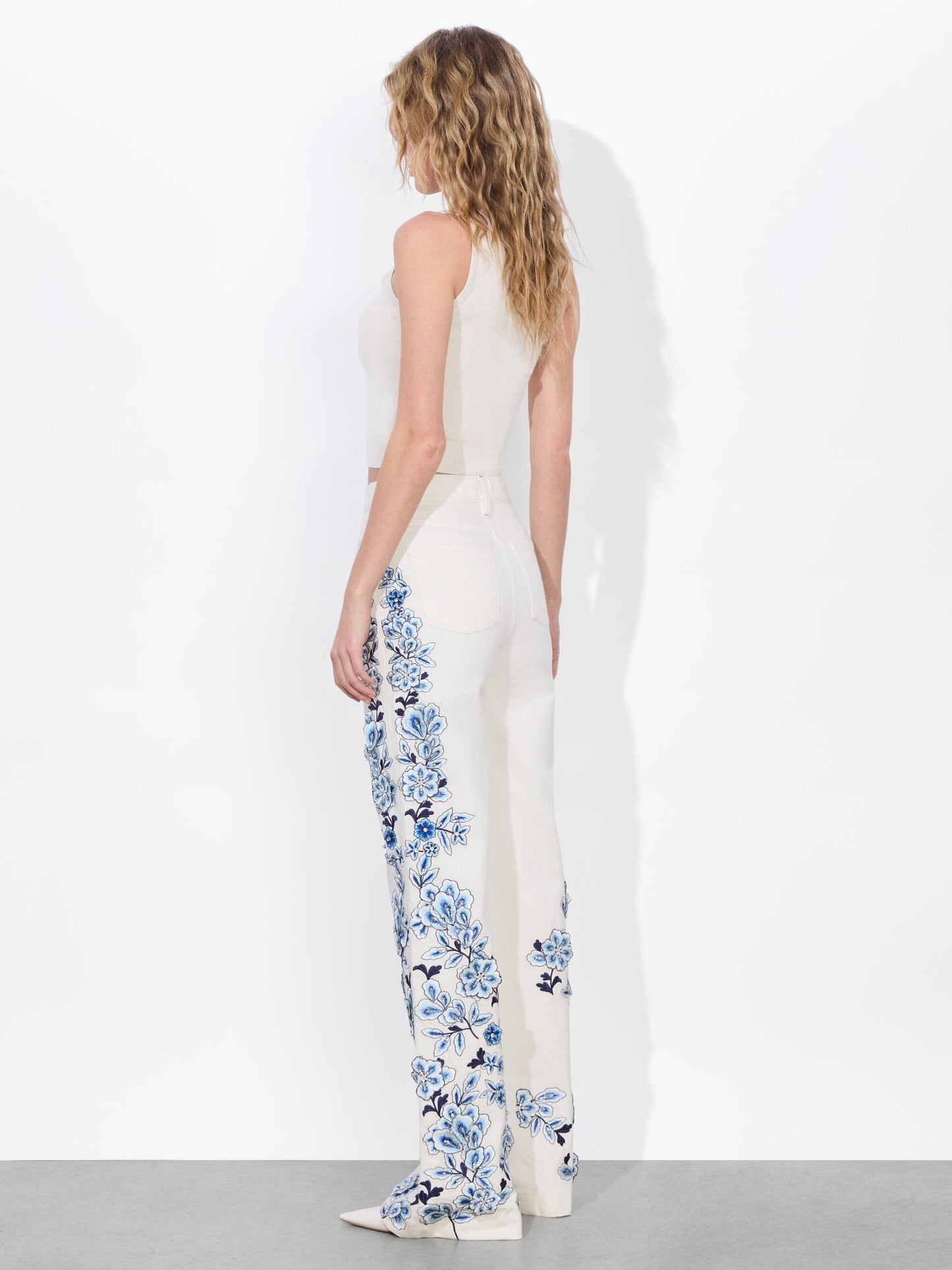 White Flared Jeans with Blue Floral Embroidery