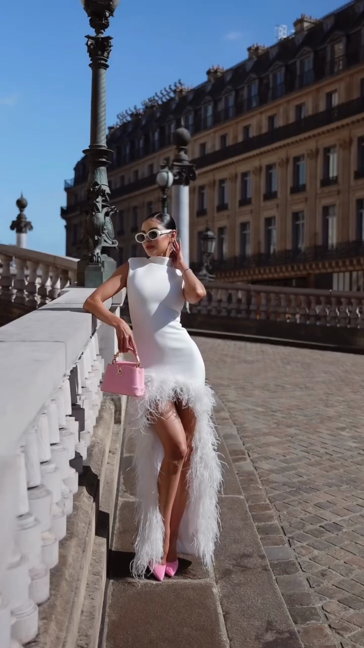 White Sleeveless Turtleneck Feather Train Mini Dress