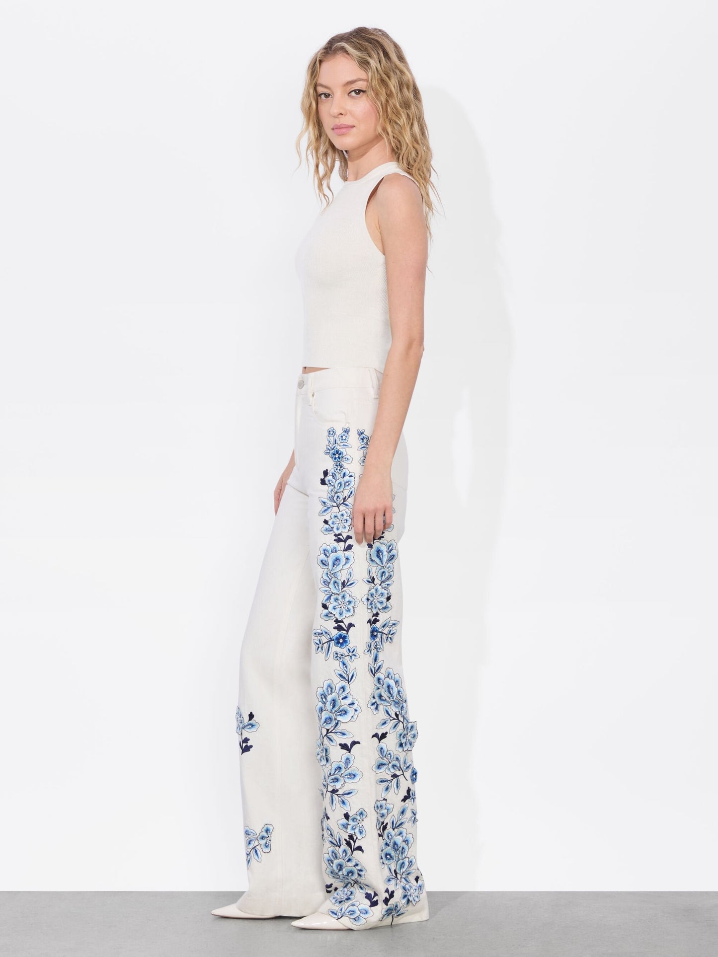 White Flared Jeans with Blue Floral Embroidery
